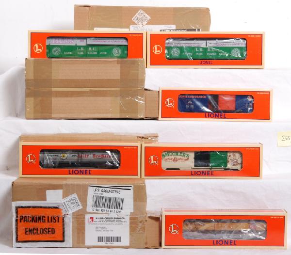11 modern Lionel LRRC, CTT, freight cars: Lionel club and freight cars all in OBs. Includes 52242 TCA 2002 Lionel blue gondola, two 52126 Classic Toy Trains Milwaukee road boxcars, two 29200 1997 LRRC boxcars, 52116 50th Anniversary LRRC Milw
