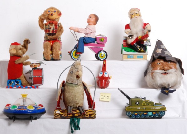 Battery operated tin, plastic, cloth and other toy: Nice large lot of battery operated toys made of various materials. Many are marked Japan, some China, some US and the rest are unmarked. ALPS drum playing elephant. Ohio Art bizzy buzz buzz with broke