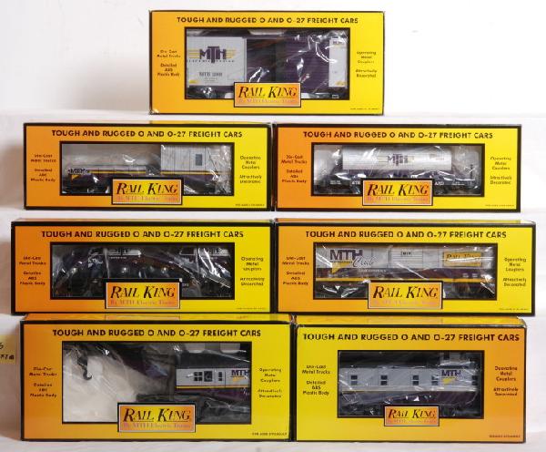 7 Railking MTH club cars: MTH Railroad Club cars in OBs. Seven cars include 30-7928 Crane, 30-7939 Crane Tender, 30-76002 flat with Ô51 Panel vans, 30-7423 Charter member boxcar, 30-74347 High Cube, and 30-73235 19th century 