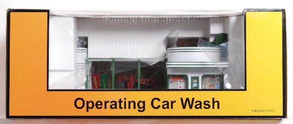 MTH Railking Speedy Operating Car Wash: MTH Railking 30-9104 Speedy Operating Car Wash in OB. Unit features smoke, sound, and operating lights and vehicle. Looks to have never been run. C9-10.
