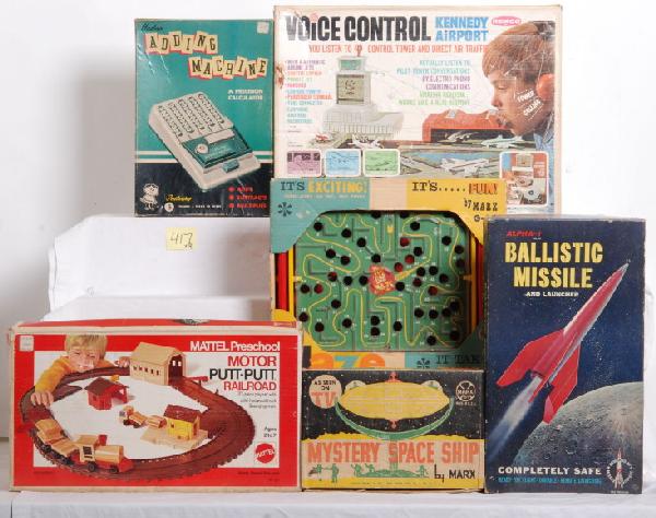 Large lot of vintage toys in original boxes: Large lot of older vintage childrenÕs games in original boxes, all appear to be complete or mostly complete. Hasbro adding machine, 5415X400. Marx Mystery Space Ship. Alpha 1 ballistic missile and la