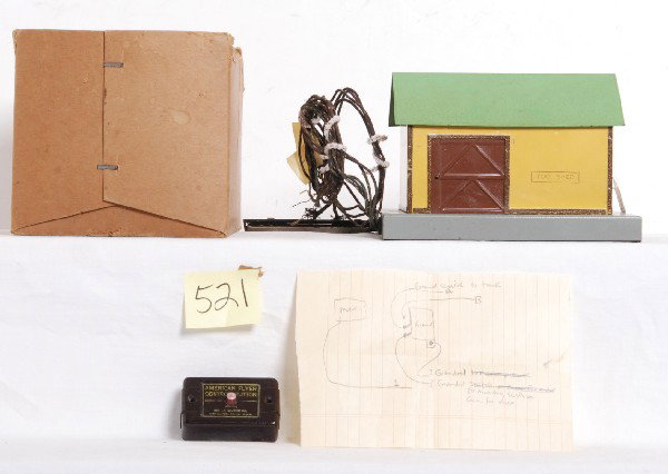 American Flyer operating tool shed with sound: Postwar American Flyer S gauge operating tool shed. Shed has sound, missing record, reproducer and speaker tube. Shed looks C6. Included is cloth wrapped wires, track trip, control button and bottom h