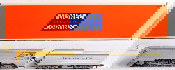 Lionel 18043 C&O Yellow belly Hudson: Lionel 18043 Yellow Belly Hudson in OB. Loco features smoke, TMCC, and Rail sounds. Loco looks C8 with some run time and one very minor scratch on the tender. OB has tear in one edge. Otherwise box in