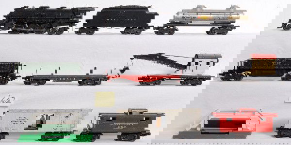 Lionel 2026, 6466WX, 3459, 2560, 3472, more: Postwar Lionel O gauge No. 2026 steam loco with touchups, 6466WX tender with whistle with chipped shell, unnumbered lumber flatcar, 3459 automatic dump car, 2465 Sunoco tank, 3472 milk car missing doo