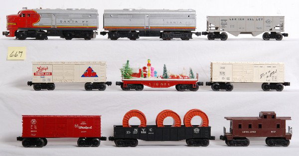 Lionel 218P, 218T, 6176, 6050, 6014, 6024, 6062, 6: Postwar Lionel O gauge 218P Santa Fe Alco powered diesel A unit, 218T Santa Fe Alco dummy B unit, 6176 LV hopper, 6050 LibbyÕs tomato juice boxcar with coin slot, 6014 Frisco boxcar, 6024 PRR Whirlpo