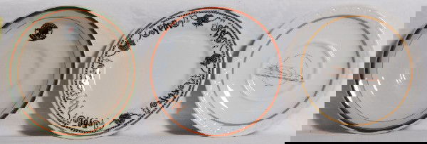 Railroad China UP, NH and NP Saucers: Three saucers from various railroads. Union Pacific 5 1/2 inch saucer in the winged streamliner pattern. Made by Syracuse china. Gold shows light wear, but logo is in very nice condition. Northern Pac