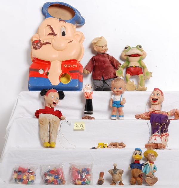 Character dolls and games, Disney, King Features: Popeye, King Features ping-pong gun style target. Olive Oyl porcelain pepper shaker, Vandor Imports. Rempel MFG. rubber frog with squeaker in foot. Plastic coated composition head with cloth covered s
