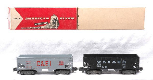 Am Flyer 24221 C&EI 24213 Wabash Hoppers LN OBs: American Flyer S gauge 24221 C & EI hopper in OB missing a tuck flap and a 24213 Wabash hopper in a white OB missing one interior flap. The 24221 has some box rubs, otherwise is C8. The 24213 is C8.