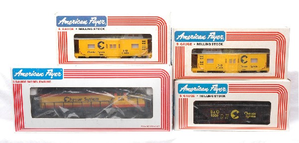 AF by Lionel Chessie 8459 9200 9400 9400 MINT OBs: American Flyer S gauge by Lionel 8459 Chessie System GP-20 diesel with Chessie freight cars; 9200 hopper and two 9400 cabooses all in OBs. The diesel and cars have never been run, C9-10.