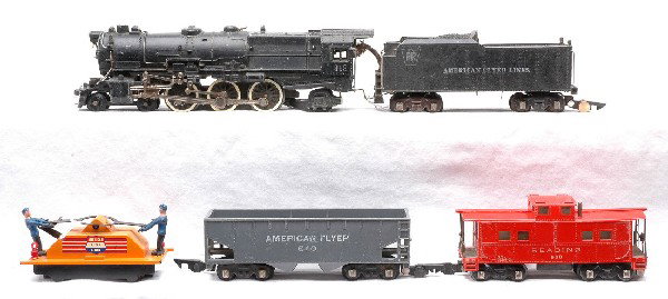 Am Flyer 312 PRR Loco & Tender 640 630 740: American Flyer S gauge 312 PRR 4-6-2 Pacific loco and tender with a 640 gray AF hopper and a 630 Reading caboose with a broken coupler. The loco and cars are C5. Also included is a 740 AFL handcar wit