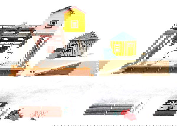 Am Flyer 779 Oil Drum Loader 787 Log Loader: American Flyer S gauge 779 oil drum loader with controller and barrels. Also included is a 787 log loader with wooden logs. The 779 is C6 and the 787 is C5-6.