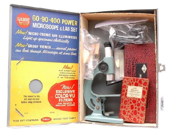 A.C. Gilbert 13033 Microscope & Lab Set in Case: A.C. Gilbert no. 13033 microscope & lab set with microscope slides and accessories in metal case. The set appears to be complete except for the manual. The metal case has some scratches and corrosion 
