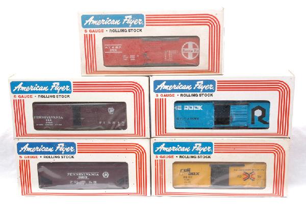 AF Lionel Freights 9205 9700 9701 9705 9707 MIB: American Flyer S gauge by Lionel freight cars; 9205 Pennsylvania covered hopper, 9700 Santa Fe boxcar, 9701 Rock boxcar, 9705 Pennsylvania boxcar and a 9707 rail boxcar in OBs. The cars have never bee