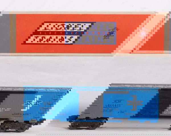 Lionel No. 6464-475 B&M type IV in Brick OB: Postwar Lionel O gauge No. 6464-475 Boston and Maine boxcar in original box, type IV, nice clean C7. Box is a Brick, old tape residue on ends, light small stain, O/W bright, crisp C8-9.