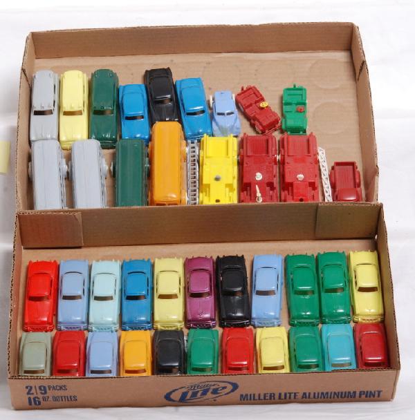 Thirty-nine Plasticville buses, fire trucks, cars.: Thirty-nine Plasticville O-S scale buses, fire trucks, cars and various trucks. One fire truck is missing ladder. Nice lot of C6-8 items.