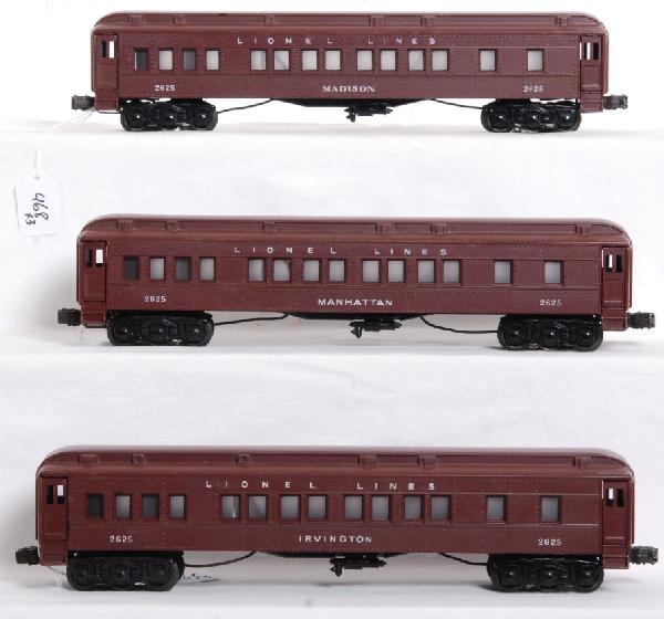 Postwar Lionel No. 2625 Madison passenger cars: Postwar Lionel O gauge No. 2625 Irvington coach, No. 2625 Manhattan coach and No. 2625 Madison coach, passenger cars. Cars look C8-9, wheels and rollers show very little run time.