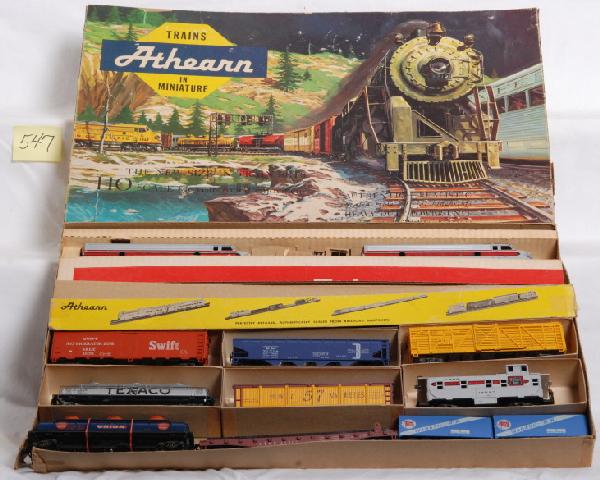 Athearn Burlington F7 freight train set in OB: Postwar Athearn HO scale Burlington F7 AA freight train in original box with dividers and inserts. Set consists of two 135 Burlington F7a diesel units, MStL boxcar, Swift reefer, GM&O flat with boat, 