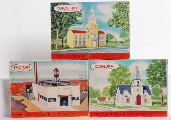 Mint Plasticville 1904 198, 1905 198, 1906 198: Postwar Plasticville O-S gauge 1904 198 cathedral, 1905 198 town hall and 1906 198 factory. Kits appear complete and undamaged. Boxes look C8-9.