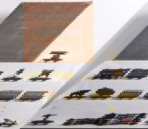 Marx boxed prewar Army Supply Train with 500: Prewar Marx electric Army Supply Train set in original box with 500 AST lithographed tinplate streamline steam locomotive with red painted firebox and tender, Ordnance Dept. car with 28 large shells f