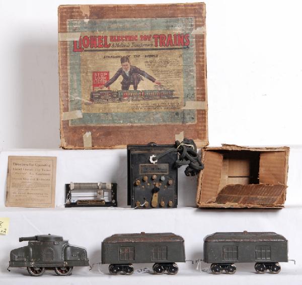 Lionel boxed prewar set, 203, 702, 702, 88, T in O: Lionel prewar O gauge boxed military set in original outfit box. 203 armored motor car, two 702 supply cars, No. 88 battery rheostat and original instructions booklet. Trains look C6 area, 203 has Man