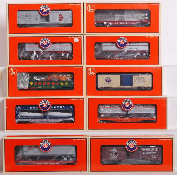 Lionel 10 modern freight cars NYC, SP, Etc.: Lionel modern era freight cars in OBs. 10 total. Cars are 19484 flat with lumber load, 19556 Swift reefer, 39239 NYC P&LE boxcar. 26022 Pacific fruit, two 36086 Southern Pacific, and 26043 Seaboard fl