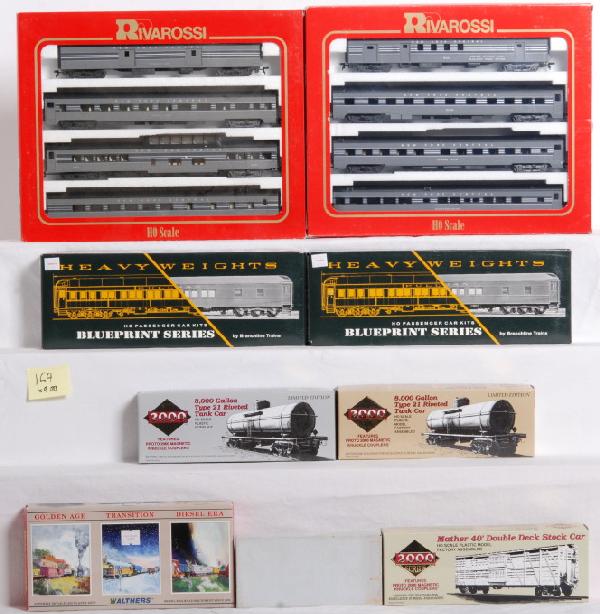 10 HO NYC pass. cars and 5 extra freight cars: HO scale New York Central passenger cars. 8 are Rivarossi and come from sets 6946 and 6947. Includes baggage, coach, diner, vista-dome, RPO, roomette, sleeper, and trail car. Two Branch line trains bl