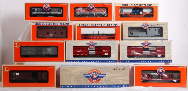 Lionel freight cars PWC, operating hobo, 12 total: Lionel O gauge freight cars in OBs. Most OBs have writing, price tags and some have small tears and shelf wear. Chars include 19458 PWC crane car, 19758 PWC work caboose in DL&W paint, two 19558 PWC M