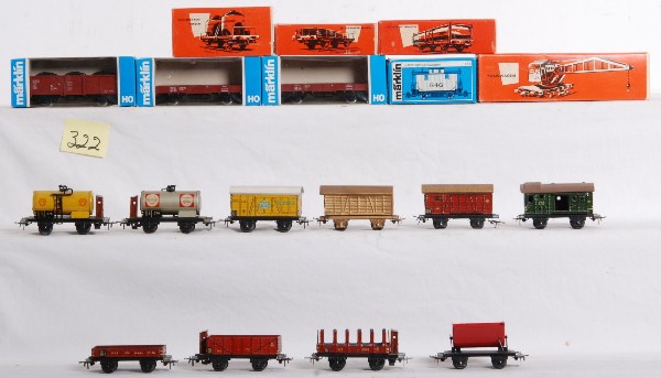18 Marklin HO freight cars 315, 4431, 382, etc.: Marklin HO scale cars. Cars in OBs include 4431 hopper, 4423 gondola, 4602 gondola, 4503 gondola, 4511 wagon, 4578 caboose, 315 crane car, and 4423 flat car. Cars are generally C8. Older cars includes