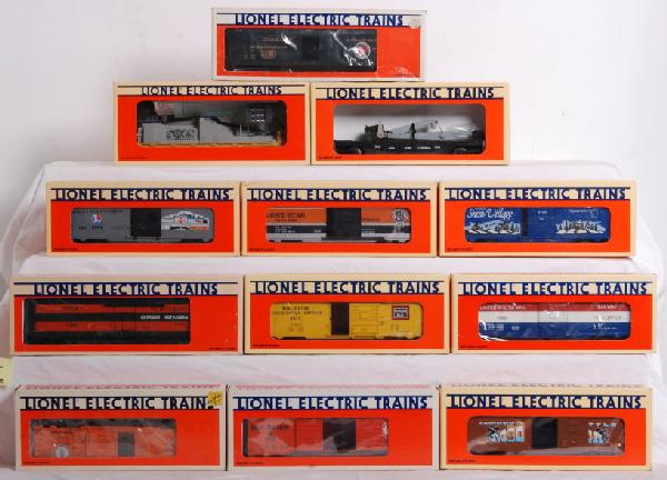 12 Lionel cars Mail, Mickey ani, Visitors ctr. : Lionel O Gauge LTI era freight cars in OBs. 12 cars total. Cars include 19932 VisitorÕs Center boxcar, 16704 Lionel TV car, 52093 TCA Lone Star boxcar, 52096 Snow Village boxcar, 19505 Great Northern