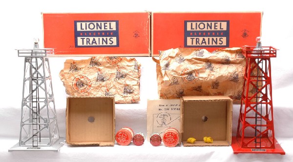 Lionel 394 Red 394 Aluminum Rotating Beacons LN: Lionel postwar 394 red rotating beacon in OB with original cardboard insert, paper wrap, two wires and 394-37 lantern in individual OB. The beacon has never been used. The paint on the tower is bright
