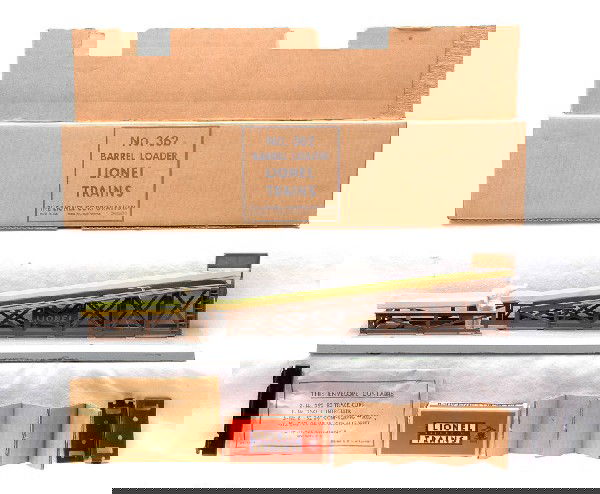 Lionel Postwar 362 Barrel Loader Boxed: Lionel postwar 362 barrel loader with original cardboard inserts, envelope with track clips and an individual OB of no. 362-78 six barrels all in OB. There are small spots of green paint on the base f