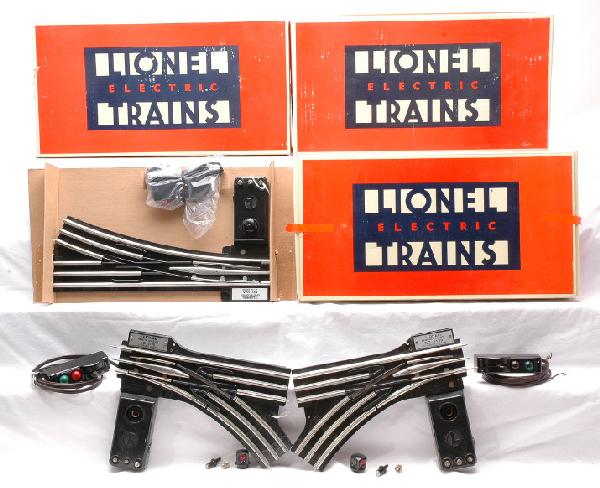 Lionel 3-5162 Remote Switches w/OBs 5132/5133 LN: Lionel three 5165 072 remote switches, right hand in OBs and one pair of 5132/5133 remote control switches with controllers. The boxed switches are C9 and the other switches are C8.