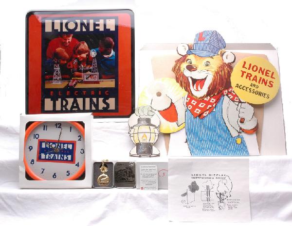 Lionel Store Display Light Clock Watch D-288 MINT: Lionel Trains store display light, a Lionel Trains battery operated wall clock and a Lionel 100th Anniversary gold tone pocket watch with a certificate of authenticity in case. Also included is a repr