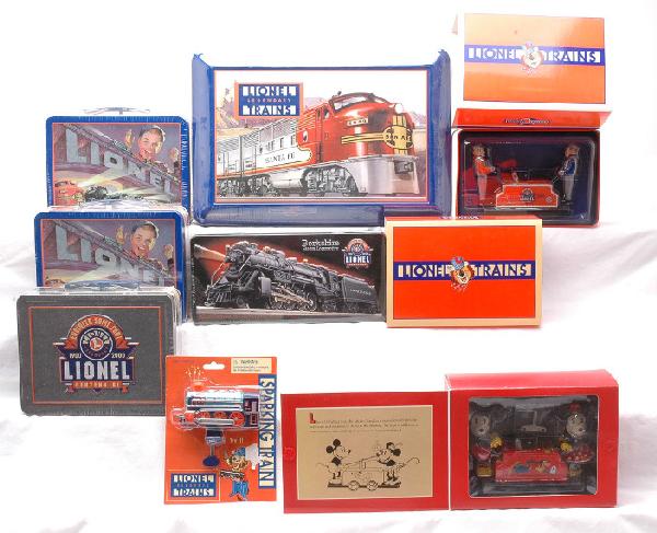 Lionel by Schylling Handcars Collectors Tins MINT: Lionel by Schylling two Railroad hand cars in tin boxed with outer sleeves, Disney Mickey Mouse hand car in OB and a sparking toy train in package, C10. Also included are three Lionel limited edition 