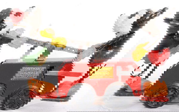 Lionel No. 1100 Mickey Mouse house car, red base: Prewar O gauge Lionel No. 1100 Mickey Mouse handcar, red base, orange shoes and green skirt on Minnie. Rod that connects drive wheel with pump handles is missing the connecting/pivoting rivet, chips a