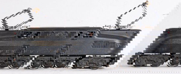 Lionel No. 2332 PRR GG-1 flat black: Postwar O gauge Lionel No. 2332 Pennsylvania GG-1 electric locomotive, flat black variation. Train has touchups, some light surface rust on pantographs. Train looks clean C6 area.