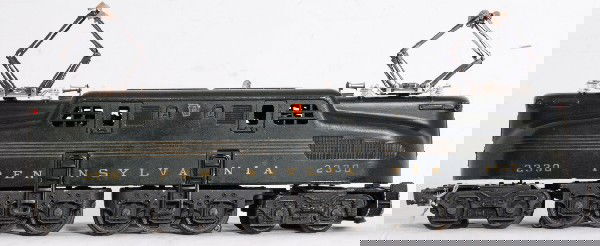 Lionel No. 2330 Pennsylvania GG-1 electric locomot: Postwar O gauge No. 2330 Pennsylvania GG-1 green 5-stripe electric locomotive, nice clean and shiny lower C7 area. Loco has a pilot that needs and very likely can be, reattached.