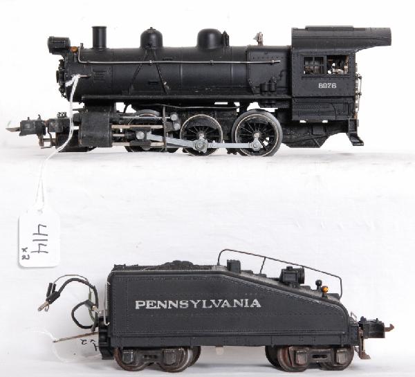 Lionel No. 232 8976 switcher w/2232B PRR tender: Prewar O gauge Lionel No. 232, 8976 steam switcher with 2232B Pennsylvania tender with bell. Loco has slightly bent cab corner, missing one jewel, tender is missing two jewels and needs rewired. Train