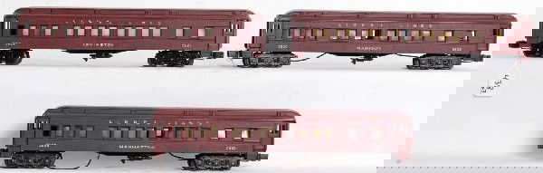 Lionel 2625, Irvington, Madison and Manhattan: Three postwar O gauge Lionel No. 2625 passenger cars, Irvington, Madison and Manhattan. Irvington has a little scuff on the roof and all three look to have been rewired, otherwise trains should clean