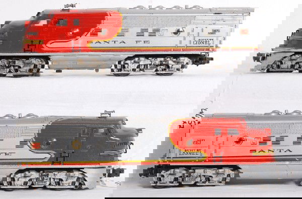 Lionel No. 2333 Santa Fe EMD F3a diesel locos: Postwar O gauge Lionel No. 2333 Santa Fe EMD F3a twin diesel units with very nice clearer porthole lens and screened roof vents. No touchups, so although not perfect locos should clean and polish to l
