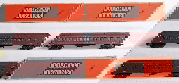 Lionel No. 2625, 2627, 2628 Madison cars in OB: Postwar O gauge Lionel No. 2625 Irvington, No. 2627 Madison and No. 2628 Manhattan, Pullman passenger coaches in original boxes. Cars look C6. Boxes are missing flaps and have tape repairs. Boxes are