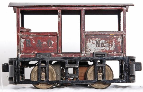Pictured Lionel No. 100 B&O No. 5 electric loco: Prewar Lionel 2 7/8 gauge No. 100 B&O electric locomotive No. 5 in maroon paint with black lettering. C4 paint. Train is pictured on page 135 GreenbergÕs Guide to Lionel Trains, 1901-1942 Vol. 1 stan