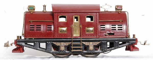 Lionel No. 380 center cab electric locomotive: Prewar Lionel standard gauge No. 380 center cab electric locomotive with some light dings to roof edges otherwise C7. Pickup roller plate is replacement with original name plate.