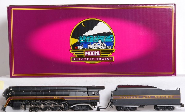 MTH Norfolk and Western J Class with Proto: MTH O Gauge Norfolk and Western J Class in OB. Catalog number is 20-3024-1. Loco features Protosound, Protocoupler, smoke and much more. Loco is C9-10 and unrun with no visible roller marks. Includes 
