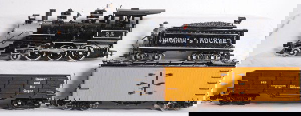 Bachmann 4-6-0 V&T plus two cars: Bachmann G Scale Virginia and Truckee 4-6-0 loco and tender. Loco does appear to have sound. Loco has some tender letters starting to peal in the corners but otherwise is C7-8. Also included are a Bac