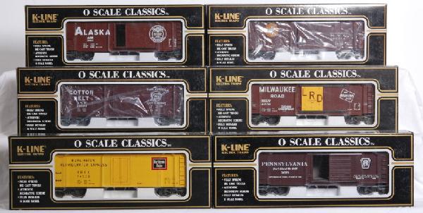 12 K Line freight cars, PRR, NYC, C&O Etc.: K Line O Gauge freight cars in OBs. 12 total including 632-1091 B&O tank car, 632-1252 C&O tank car, 671-1371A Milwaukee Road ore car, 765-2011 Southern Railroad boxcar, 762-1331 Burlington Route reef
