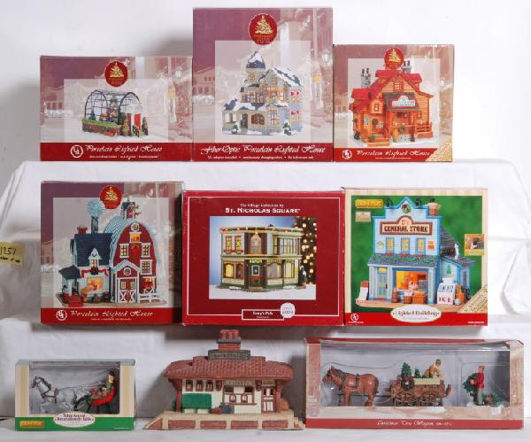 12 St. Nicholas Square and Lemax buildings: Twelve St. Nicholas Square and Lemax ceramic buildings. Includes Train Station, lighted barn, lit barn with attached house, illuminated train depot, CJÕs General Store, BillÕs Barber Shop, PattyÕs 
