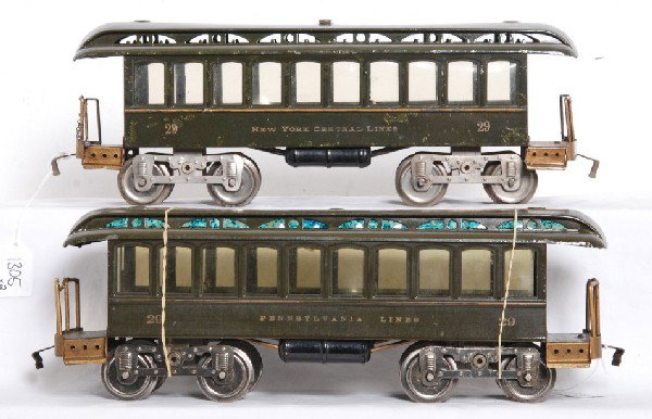 Two Lionel S.G. No. 29 coaches, NYC and PRR: Prewar Lionel standard gauge passenger coaches, one New York Central Lines and one Pennsylvania Lines with Lionel MFG Co embossed frame. Coaches look C6 area with some roof dings and PRR missing roof 