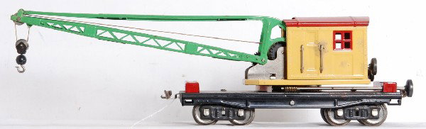 Lionel S.G. No. 219 operating derrick, yellow cab: Prewar Lionel standard gauge No. 219 operating derrick with yellow cab, red roof and tool boxes and green boom. Crane has rust forming, otherwise C6. Nickel trim.