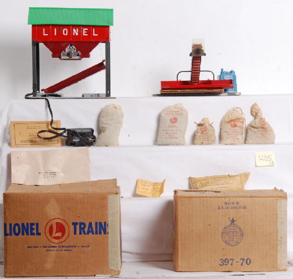 Lionel No. 397 and 497 coalers in OB: Postwar O gauge Lionel No. 397 operating coal loader with inserts, full 206 bag of artificial coal, original inspection slip and components in envelope. No. 497 coaling station with inserts, controlle